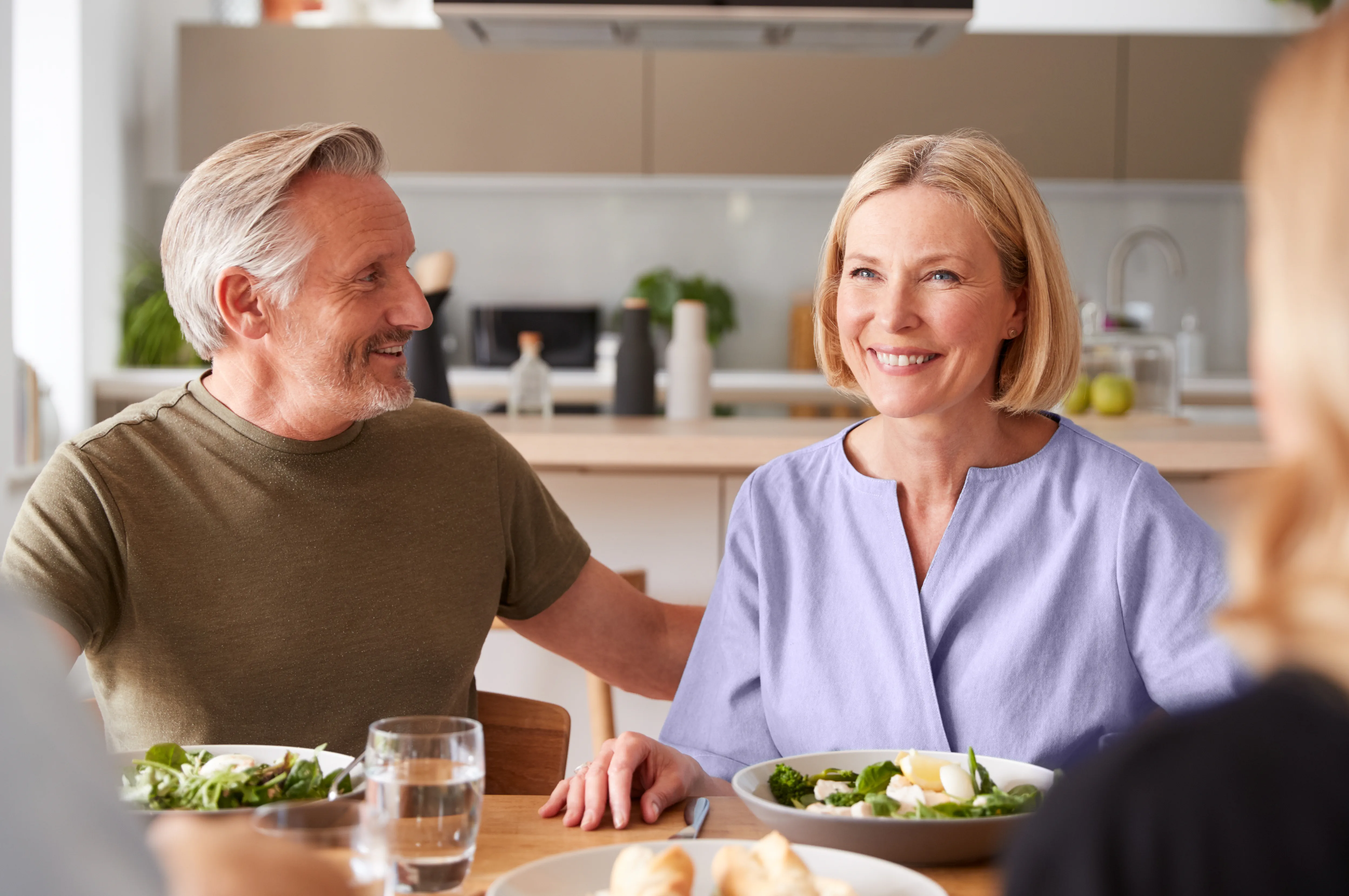Man and woman sitting at dinner table